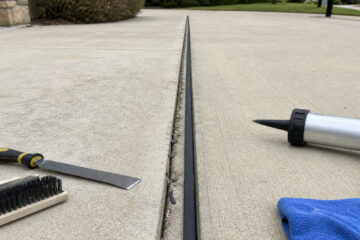 Concrete Driveway Joint Maintenance for Bryan Homes - concrete service scene in Bryan, Texas